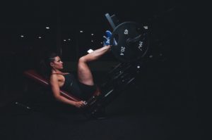 Photo of a woman strength training.
